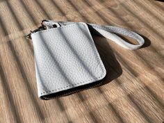 You can buy this item with a 50% discount by following the link: https://www.etsy.com/listing/1816157582/white-pocket-zip-around-wallet-bifold But note that there is a product in one copy, one leather color and thread and standard size. 🤎 Description There is one compartment inside, which is divided by a divider, in these compartments you can fold your bills and coins. There are also 4 credit card slots (2 on each side of the wallet). Credit or bank cards, driver's documents can easily fit ther Handmade White Wallet For Everyday Use, Handmade White Wallets For Everyday Use, Bifold Card Holder With Zipper Pouch For Daily Use, Daily Use Bifold Card Holder With Zipper Pouch, White Wallets With Cell Phone Pocket As Gift, White Wallet With Cell Phone Pocket As Gift, Handmade Purse, Handmade Purses, Clip Wallet