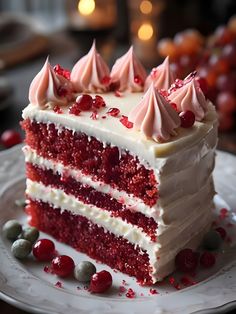 a slice of red velvet cake with white frosting