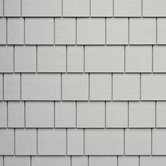 a close up view of a white brick wall