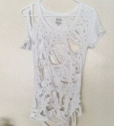 White Short Sleeve Grunge Crop Top, Trendy Distressed Tops For Festivals, Trendy Distressed Tops For Festival, White Grunge Crop Top With Crew Neck, White Distressed Fitted Tops, White Fitted Distressed Tops, Fitted White Distressed Tops, Ripped Short Sleeve T-shirt For Summer, White Grunge Crop Top For Spring