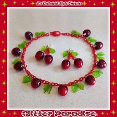 ✷ 30s Celluloid Style Cherries ✷ 📐 Size: 42 cm Handmade in France with Love 💘 by Glitter Paradise www.glitterparadise.com www.etsy.com/Shop/GlitterParadise Wholesale orders and other enquiries welcome Glitter Paradise® Do not copy, do not reproduce Celluloid Jewelry, Cherry Necklace, Cherry Earrings, Vintage Celluloid, Jewelry Set, Cherry, Jewelry Sets, Glitter, Red