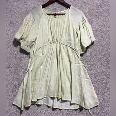 Blu Pepper Woman’s Baby Doll Tie Blouse Flutter Short Sleeve Light Green In Color Size Medium New With Tags Please See Pictures For Details On Condition And Measurements. Smoke Free Home Dog Friendly Home Colors May Vary Due To Lighting Ask Questions Before Purchasing Bohemian Short Sleeve Solid Top, Bohemian Style Solid Color Top With Short Sleeves, Bohemian Style Solid Short Sleeve Top, Bohemian Short Sleeve Top, Summer Puff Sleeve Top With Ruffle Hem, Summer Solid Color Puff Sleeve Blouse, Summer Tops With Ruffle Hem And Puff Sleeves, Chic Short Sleeve Peasant Top For Spring, Casual Smock Peasant Top With Short Sleeves