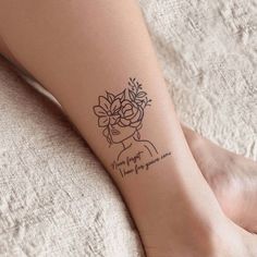 a woman's foot with a flower tattoo on her left leg and the words, i hope for you