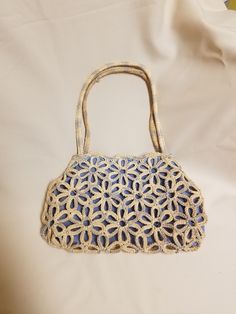 "Beautiful purse for macrame lovers, it has a beautiful flower pattern Unique style Dimensions: 13\" x 9\" PLEASE CONTACT FOR ANY QUESTIONS! FINAL SALE, NO RETURNS, NO EXCHANGES!" Bohemian Blue Bags For Spring, Blue Handwoven Bags For Spring, Bohemian Everyday Flower Shoulder Bag, Spring Macrame Crochet Tote Bag, Spring Natural Macrame Crochet Bag, Blue Crochet Bag For Spring, Spring Blue Crochet Bag, Handmade Blue Shoulder Bag For Spring, Blue Bohemian Crochet Bag With Woven Details