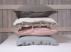 four pillows stacked on top of each other