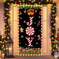 christmas door decoration with lights and candy canes