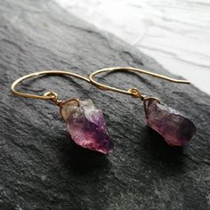 Raw Amethyst earrings, Raw stone earrings, Raw crystal earrings, Gemstone earrings, Boho earrings, Birthstone earrings, Girlfriend gift: I believe in the power of nature and healing stones with their own characteristics to maintain a healthy body and mind. I make these Amethyst earrings to order with two raw Amethyst crystals and 24k gold plated brass wire or silver-plated brass wire which is of course hypoallergenic and nickel free. The wire is 1mm thick. The length of the Amethyst stones varie Raw Stone Earrings, Raw Gemstone Earrings, Healthy Body And Mind, Earrings With Stones, Raw Crystal Earrings, Pyrite Earrings, Earrings Outfit, Raw Stone Earring, Raw Stone Jewelry