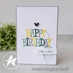 a birthday card with the words happy birthday on it and a flower in the background