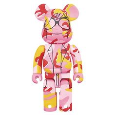 a pink and yellow camouflage bear toy next to it's smaller size doll on a white background