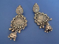 Astounding big silver earrings from Rajastan. Tribal earrings from Jaisalmer area, 92.5 silver masterfully carved. Notice! Earlobe piercings should be wide for these earrings. Length: 7.8 centimeters Weight. 22 grams each We keep the original patina of our vintage silver jewelry pieces, but it can be cleaned on request.  Shipping: Certified Post Office Mail with track number Thanks for your visit! Ornate Earrings With Intricate Design For Rituals, Ornate Earrings For Rituals, Oxidized Finish Earrings For Rituals And Festivals, Heavy Bohemian Sterling Silver Earrings, Traditional Sterling Silver Plug Earrings, Ornate Oxidized Finish Earrings For Festive Occasions, Traditional Oxidized Finish Earrings For Ceremonial Occasions, Silver Temple Jewelry Earrings For Rituals, Traditional Handmade Silver Plug Earrings