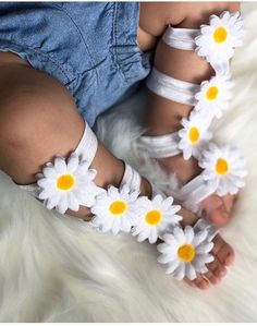 Introducing our Daisies gladiator barefoot sandals! These gladiator barefoot sandals are definitely a must have to complete any look . Made of white soft elastic for your little ones comfort. The gladiator sandal is adorned with white daisies going down the middle of the foot. Your little princess is going to be ready for spring and summertime with these beauties. Barefoot sandals are perfect for birthdays, cakemsash, photoprop, spring, summer holidays  and any other special occasion your little princess will be attending.  ** Some items may contain small       objects, all items should be worn       with adult supervision. **  Before placing your order please make sure to check the shipping time & see if you're ok with the time frame. If you need the item before a specific date please mes White Barefoot Sandals For Summer Festivals, Adjustable Barefoot Sandals For Spring Party, White Barefoot Sandals For Spring Party, Handmade Ankle Wrap Barefoot Sandals For Spring, Handmade White Barefoot Sandals For Summer, Adjustable Barefoot Sandals For Spring Gift, White Barefoot Sandals For Spring Vacation, White Barefoot Sandals With Ankle Strap For Spring, Adjustable Barefoot Sandals As Spring Gift