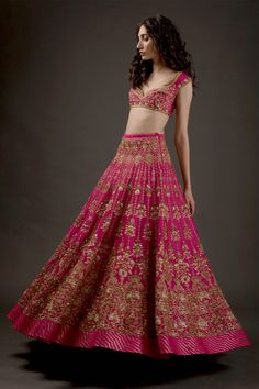 Editor's Note Chanderi Silk Lehenga With Resham Thread Embroidery And Hand Embroidery Work Paired With Chanderi Silk Embroidered Dupatta & Blouse Color: Fuchsia Fabric: Chanderi Silk Care: Dry Clean Only About the Designer Rohit Bal is intensely concerned with design as an art form. The designer draws on history, fantasy and folklore to create masterpieces that are desired by discerning aficionados around the globe. Rohit has a deep understanding of the psyche of the fashion world and it reflect Traditional Dresses Indian, Embroidery Lehenga, Reception Bride, Jayanti Reddy, Party Reception, Black Lehenga, Rohit Bal, Embroidered Crop Tops, Embroidered Lehenga