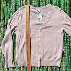 70% Rayon/ 30% Nylon. Color Is A Dusty Light Pink (Ballet Pink). Dusty Light Pink, Light Pink Cardigan, Pink Cardigan Sweater, Ballet Pink, Pink Cardigan, Cardigan Sweater, Sweater Cardigan, Sweaters & Cardigans, Light Pink