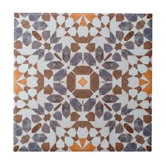 an orange, blue and white tile pattern