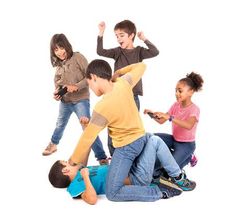 group of children sitting on the floor playing with cell phones stock photo - 957982