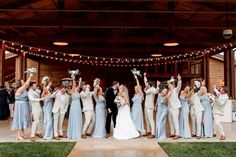 a group of people that are standing in front of each other on a dance floor