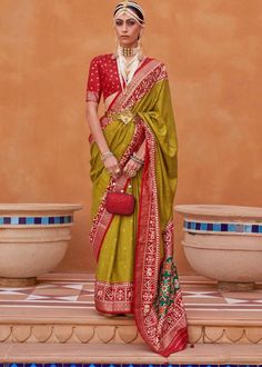 This luxurious printed Patola Saree is every women's dream. With carefully selected designs in vibrant colors, you can't go wrong with this choice. --------------------------------- S A R E E ● D E T A I L S --------------------------------- ● Fall and Edging : Done ● Tassel : See in Option ● Petticoat : On request Extra Charges ● Drapping Saree (Ready to wear) : On Request Extra Charges ● Blouse : Matching Unstitched Piece (See in option) ● Occasion : Wedding, Party, Festive, Function ● Type: B Patola Border, Drapping Saree, Saree Green, Patola Print, Classic Saree, Patola Silk Saree, Patola Saree, Color Blouse, Blouse Material