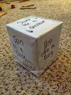 a box with writing on it sitting on the floor