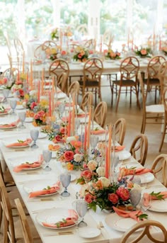 a long table with many plates and place settings