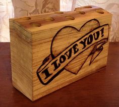 a wooden box with the words i love you on it