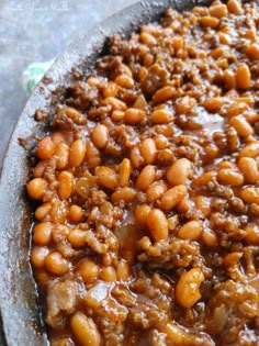 baked beans and meat in a skillet ready to be eaten