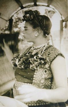 an old black and white photo of a woman