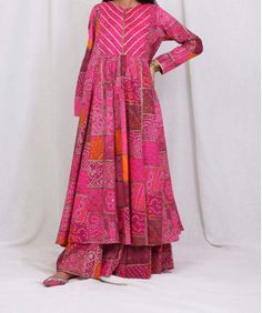 Multi-colour Frock, Multi-colour Shirt, Multi-colour kameez  Description:  The pink shirt is a vibrant and eye-catching piece of clothing. It's made from a soft and lightweight material that drapes effortlessly over the body, making it comfortable to wear. The shade of pink is a bright and playful hue that adds a pop of colour to any outfit. The shirt features a classic collar and button-front design, with long sleeves that can be rolled up for a more casual look. It's a versatile piece that can be dressed up with a trouser  or  palazzo for a more laid-back vibe. Overall, the pink shirt is a stylish and fun addition to any wardrobe. Fabric: Lawn  Sleeve-length: Full  Frock Length :Long Lawn Long Frock Design, Lawn Frock Design, Full Frock, Frock Long, Lawn Frock, Pink Frock, Long Kameez, Pakistani Women Dresses, Pakistani Women