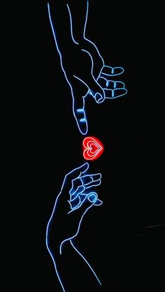 two hands reaching towards each other holding a red heart in the dark, with blue lights