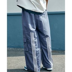 Striped Panel Sports Wide-Leg Pants Material: 45% Nylon + 55% Polyester Size: S, M, L, XL Color: Black, Yellow, Blue Applicable Scene: Leisure, Daily, Vacation Relaxed Fit Sportswear Pants For Outdoor Activities, Sporty Full-length Cargo Pants For Outdoor Activities, Baggy Full-length Cargo Pants For Sports, Baggy Full Length Cargo Pants For Sports, Blue Nylon Full-length Activewear, Baggy Blue Urban Cargo Pants, Urban Blue Baggy Cargo Pants, Baggy Joggers For Outdoor Activities, Blue Stretch Straight Leg Cargo Pants