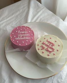 two cakes sitting on top of a white plate