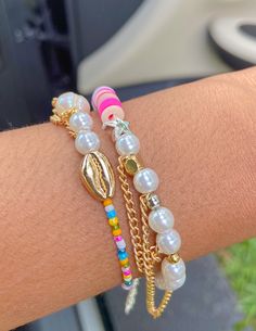 Use this link to sign up for our email list and get 25% off your order! http://eepurl.com/idCA0D This bracelet is so stunning! Made from multicolored seed beads, a gold shell charm, both acrylic and freshwater pearls,  gold chain, and other assorted accent beads, this perfect piece looks cute with any outfit. When you order you will receive a thank you card (signed by zoe) and a pink organza bag to store your new jewelry in. Care tips: be sure to treat all MadeByZoe jewelry with extra special care by following these tips: remove when, swimming, working out, sleeping, etc. Contact with water could result in damage to your jewelry.   Thank you for shopping with us! have any questions or concerns, just message me! - Zoe Bracelets Preppy, Silver Star Bracelet, Surf Jewelry, Preppy Bracelets, Pearl Bracelet Gold, Preppy Jewelry, Bracelets Design, Bracelet Pearl, Jewelry Accessories Ideas