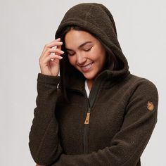 Trek through the mountains or around town in comfort with the Fjallraven Kaitum Fleece Jacket. The durability of polyester meets the comfort of and function of wool in this blend that wicks moisture and regulates temperatures. With the natural odor-resistant properties of wool, you can wear it under a shell or while unwinding after a day on the trails without having to worry about how you smell. After a long day, you can relax in comfort with a fleece-lined hood that keeps you cozy on chilly Cozy Fleece Jacket For Fall Outdoor Activities, Cozy Fleece Jacket For Fall Outdoor Use, Windproof Fleece Jacket For Outdoor Fall Use, Windproof Fleece Jacket For Fall Outdoor Activities, Windproof Fleece Jacket For Fall Hiking, Fleece Hooded Jacket For Outdoor Fall Activities, Fall Fleece Hooded Jacket For Outdoor, Fall Outdoor Fleece Hooded Jacket, Cozy Fleece Outerwear For Hiking