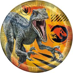 a paper plate with an image of a t - rex and other dinosaurs on it