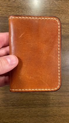 Vertical bifold Wallet. Veg tan outer with Wickett and Craig traditional harness interior. Four card, pockets and two larger pockets behind the cards. Larger pockets for folded cash. handmade item that will last a lifetime and gain character as time passes. Money Clip Wallet, Bifold Wallet, Purse Wallet, Wallets, Handmade Items, Wallet