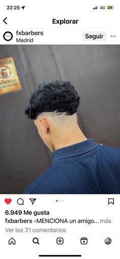 the back of a man's head with black hair