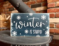 This pine wood sign measures approximately 5.5" tall, 9" wide and 0.75" thick (making the sign freestanding). Sign is hand-painted in a couple different color combinations. It has been distressed and stained to give it a rustic appearance. The back of the sign is stained and branded with The Country Crab logo. Winter Signs And Sayings, Crab Logo, Seasonal Signs, Winter Door Decorations, Christmas Ideas Gifts, Entry Signs, Winter Decorations Diy, Winter Door, Winter Signs