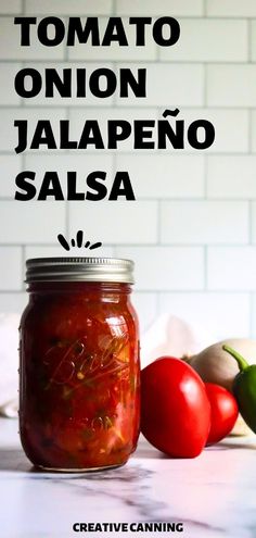 tomatoes and peppers are in a jar with the words tomato onion jalapeno salsa