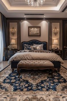 a large bed sitting in the middle of a bedroom next to a chandelier