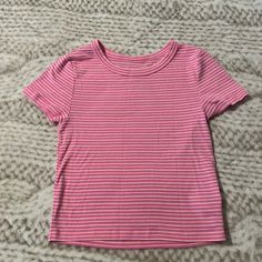 Never Worn, Pink With Stripes. Cute Striped Short Sleeve T-shirt, Basic Striped Short Sleeve Tops, Pink Cotton Casual Short Sleeve Top, Casual Pink Cotton Short Sleeve Top, Spring Striped Graphic Tee T-shirt, Cute Striped Short Sleeve Tops, Striped Short Sleeve Tops For Spring, Striped Graphic Tee For Spring, Pink Striped Shirt