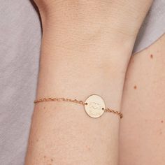 Carry a piece of their heart wherever you go with our Merci Maman x Mellipou Personalized Pastille Chain Bracelet. This timeless bracelet features an engraved Mellipou logo and the hand-engraved names and birth dates of loved ones for a mom to wear and adore. Each bracelet makes a perfect gift for a special mom to treasure.&nbsp;18K Champagne Gold Plated, 925 Sterling Silver or 18K Rose Gold PlatedChain length: 7, adjustable to 6.3Pastille charm: 0.6 x 0.6Engraved by hand in our workshopSent Engraved Heart Bracelet As Gift, Engraved Round Heart Bracelet As Gift, Engraved Heart Bracelet As A Personalized Gift, Heart-shaped Engraved Name Bracelet For Anniversary, Engraved Round Heart Bracelet For Anniversary, Engraved Heart Bracelets For Friendship, Engraved Adjustable Heart Bracelet For Anniversary, Heart Shaped Engraved Bracelets For Friendship, Heart-shaped Engraved Friendship Bracelet