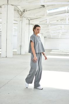 "Loungewear Set of 2, Wide Leg Pants, Short Sleeve Top ◈ Stylish and chic fashion is our shared dream! You can be sure that this piece is made with a lot of love and craftsmanship. ◈ S I Z I N G ◈ The model wears size S. This item is available from XS to 2XL. Please, have a look at my Size Chart below before placing your order. The model in the picture is 63'' (160 cm) tall. ◈ D E L I V E R Y ◈ This item will be shipped in up to 5 days after your order was placed. We use Express worldwide shippi Pants Short, Lounge Outfit, Pants Loose, Gray Top, Dot Skirt, Loungewear Set, Beautiful Skirts, Chic Fashion, Grey Top