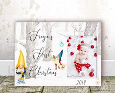 a baby's first christmas photo frame with gnomes and snowman on it