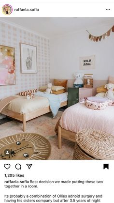 a bedroom with two twin beds in it and some pictures on the wall behind them