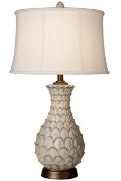 a lamp with a white shade on it