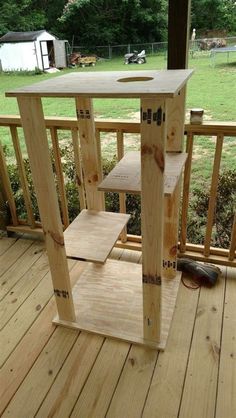 a wooden deck with a sink on it