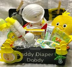 a baby's diaper caddy filled with toys