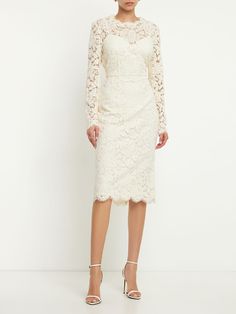 Find DOLCE & GABBANA Lace Long Sleeve Midi Dress on Editorialist. This Dolce & Gabbana midi dress features a lace design with long sleeves and a round neck. It is crafted from a lightweight fabric and has a concealed back zip closure. The dress is fully lined with crepe de chine. Long Sleeve White Midi Dress, Stretch Lace Dress, Calf Length Dress, All Over Pattern, White Long Sleeve Dress, Dolce Gabbana Dress, Long White Dress, Lace Long Sleeve, Long Sleeve Lace Dress