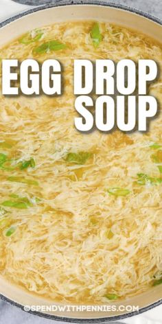 an egg drop soup in a pan with the words egg drop soup overlaying it