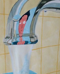 a water faucet with a cartoon character under it