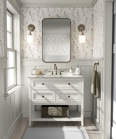 a bathroom with a sink, mirror and rug on the floor in front of it